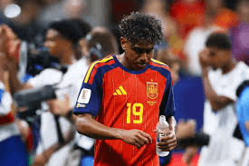 Spain player walking off the pitch during World Cup action